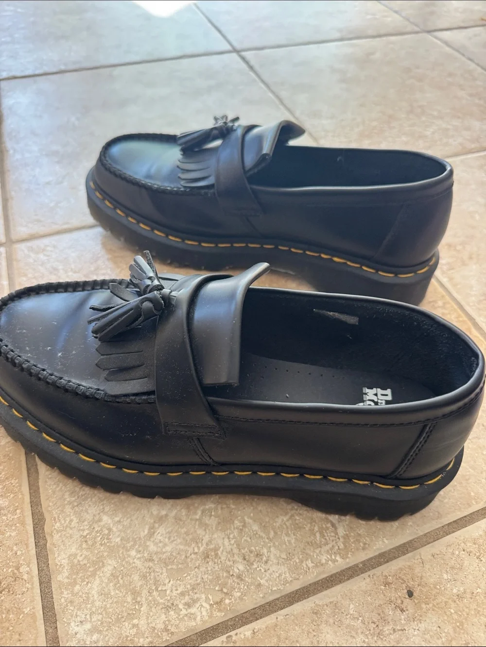 Dr. Martens Black Leather Tassel Kiltie Loafers with Yellow Stitching